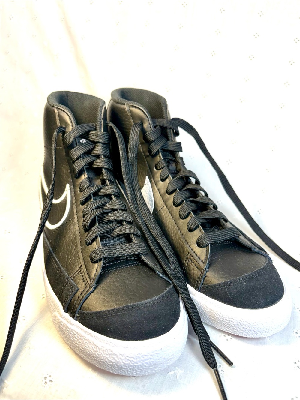 Nike Black High-Top Sneakers with White Tongue Text
